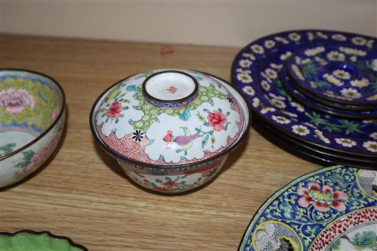 A Chinese Canton enamel brushwasher, two bowls and cover, four plates and three stands, 19th/20th century